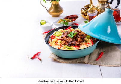 الطبخ المغربي الطحين المغربي Tajin-couscous-vegetables-meat-on-260nw-1386419168