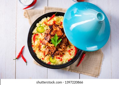 الطبخ المغربي الطحين المغربي Tajin-couscous-vegetables-meat-on-260nw-1397220866