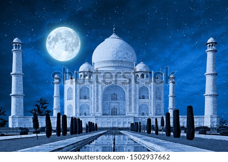tajmahal in blue light shade with full moon