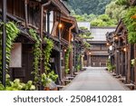 Takayama, Japan at the historic Sannomachi Street in the old town at twilight.