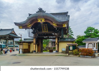 Takayama, Japan - October 2, 2019: View Of The Gate Of The Shinshuotaniha Shoren Temple, With Locals And Visitors, In Takayama, Japan