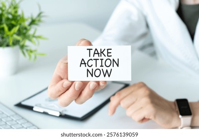 Take Action Now is an imperative statement urging someone to act promptly or immediately, text concept on card. High quality photo