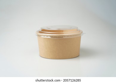 Take Away Salad Box Disposable Food Container Craft Paper Mock Up On Grey Background With Copy Space. Delivery Food Concept.