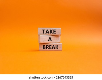 Take A Break Symbol. Concept Words 'Take A Break' On Wooden Blocks. Beautiful Orange Background. Business And Take A Break Concept. Copy Space