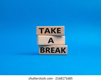 Take A Break Symbol. Concept Words 'Take A Break' On Wooden Blocks. Beautiful Blue Background. Business And Take A Break Concept. Copy Space.