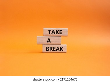 Take A Break Symbol. Concept Words 'Take A Break' On Wooden Blocks. Beautiful Orange Background. Business And Take A Break Concept. Copy Space.