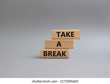 Take A Break Symbol. Concept Words 'Take A Break' On Wooden Blocks. Beautiful Grey Background. Business And Take A Break Concept. Copy Space.