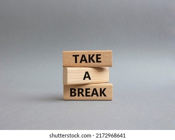 Take A Break Symbol. Concept Words 'Take A Break' On Wooden Blocks. Beautiful Grey Background. Business And Take A Break Concept. Copy Space.