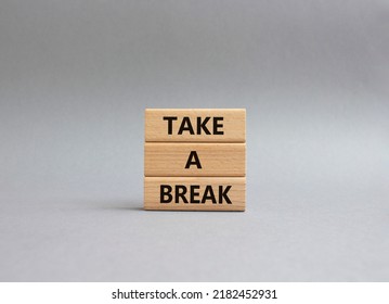 Take A Break Symbol. Concept Words 'Take A Break' On Wooden Blocks. Beautiful Grey Background. Business And Take A Break Concept. Copy Space.