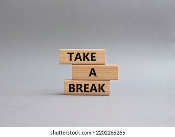 Take A Break Symbol. Concept Words 'Take A Break' On Wooden Blocks. Beautiful Grey Background. Business And Take A Break Concept. Copy Space.