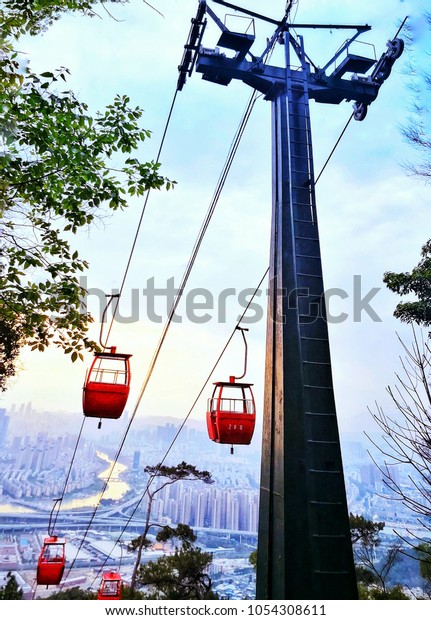 take a cable\
car up to the top of the\
mountain