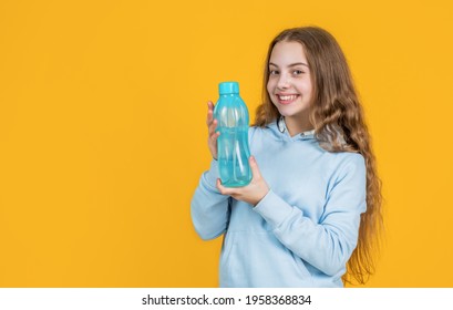 take care of you. athletic kid care of water balance in body. hydration. feel thirsty. protein and vitamin bottle. happy and healthy teen girl. fit child drink water after training. sport is life - Powered by Shutterstock