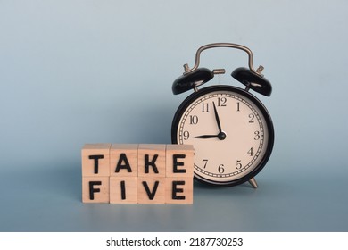 Take Five Concept With Alarm Clock