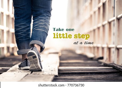 Take One Little Step At A Time  - Inspiration Quote On Concept Photo, Woman Walking On The Wood Bridge