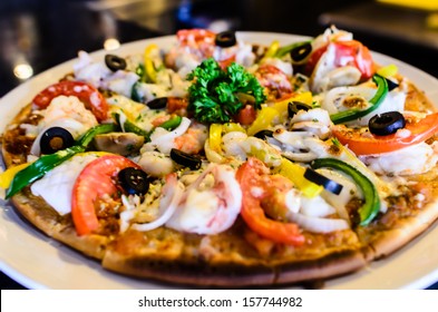 Take out Pizza chef - Powered by Shutterstock