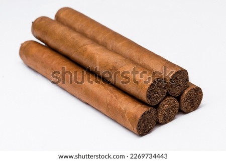 Take a photo of a box and a cigar on a monochrome background
Take a photo of a box and a cigar on a white background
