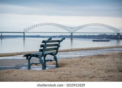 Take A Seat Along The Mississippi River In Memphis Tennessee And Enjoy The View Of The River And I-40 Bridge.