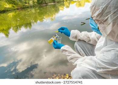 Take water samples for analysis. Selective focus. nature.