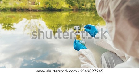 Take water samples for analysis. Selective focus. nature.