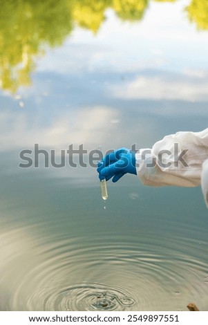 Take water samples for analysis. Selective focus. nature.