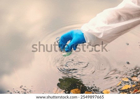 Take water samples for analysis. Selective focus. nature.