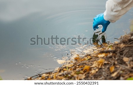 Take water samples for analysis. Selective focus. nature.