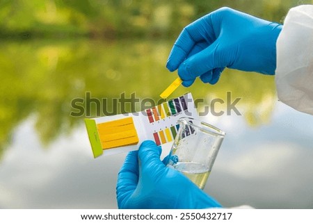 Take water samples for analysis. Selective focus. nature.