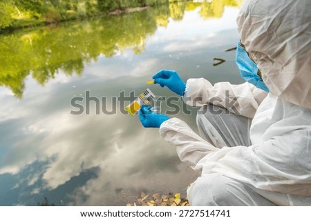 Take water samples for analysis. Selective focus. nature.