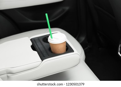 Takeaway Paper Coffee Cup In Holder Inside Car