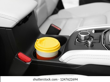 Takeaway Paper Coffee Cup In Holder Inside Car