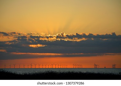 Taken at Botany Bay, the northern most of seven bays in Broadstairs in Broadstairs, Kent, England. May 13th 2012 

Sunrise over Thanet offshore windfarm opened September 23rd 2010, with 100 turbines 

