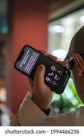 Taken at Dubai, U.A.E. on 29th of May 2021: Costa Coffee parters with RightHear - an app for the blind and visually impaired; A close up of the mobile phone and app being used by a blind Arab man.