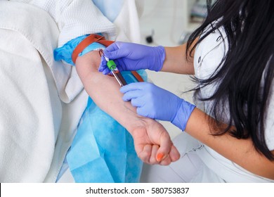Taking a blood sample - Shutterstock ID 580753837