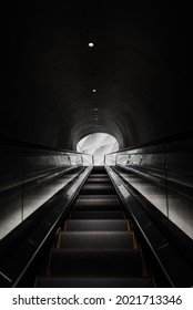 Taking The Escalator Up To Top Floor