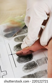 Taking fingerprints - Shutterstock ID 220122721