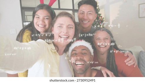 Taking five adults posing on couch at home in knitwear, holding phone, showing tree, math overlays. Festive, group, cozy, holiday, sweater, santa, reindeer