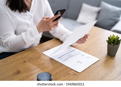 Taking Invoice Document Photo Using Phone Or Smartphone - Shutterstock ID 1969865011