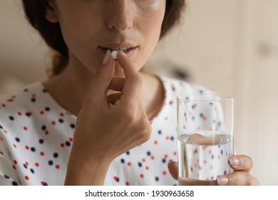 Taking Meds. Close Up Cropped Shot Of Young Lady Hold Glass Of Water Prepare To Swallow Pill. Sick Woman Drink Painkiller Antidepressant Fat Burner Supplement Antibiotics Use Emergency Contraception