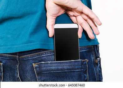 Taking modern smartphone out of pocket.