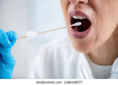 Taking A Mouth Swab For DNA Analysis 