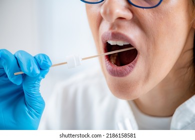 Taking A Mouth Swab For DNA Analysis 