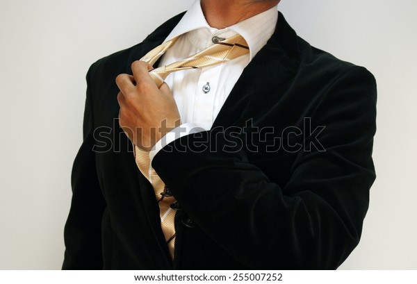 Taking off\
his tie Resignation from too much\
stress