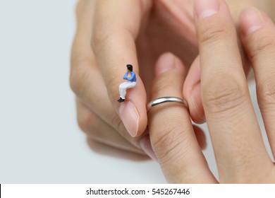 Taking Off The Wedding Ring.