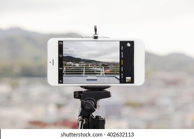Taking Photo By Smart Phone On A Tripod 
