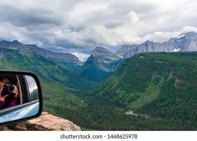 Taking photos out the car window on scenic drive through mountains - Powered by Shutterstock