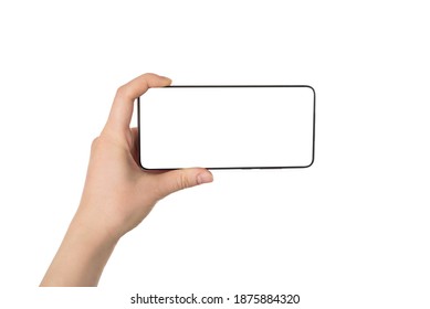 Taking picture concept. Pov first person view photo of female hand holding telephone in horizontal position taking image isolated white background - Shutterstock ID 1875884320