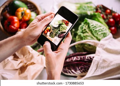 Taking picture of different beautiful vegetables and greens with a mobile phone. - Powered by Shutterstock