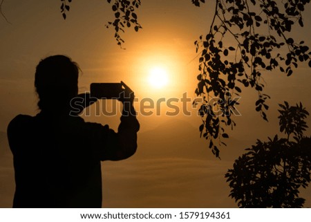 Taking a Picture of the Sunrise