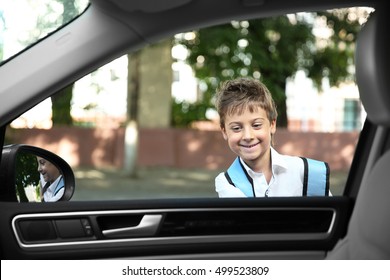 Taking Pupil After School. Boy Near Car