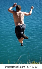 Taking Risk Young Man Jumps Cliff Stock Photo 5442760 | Shutterstock